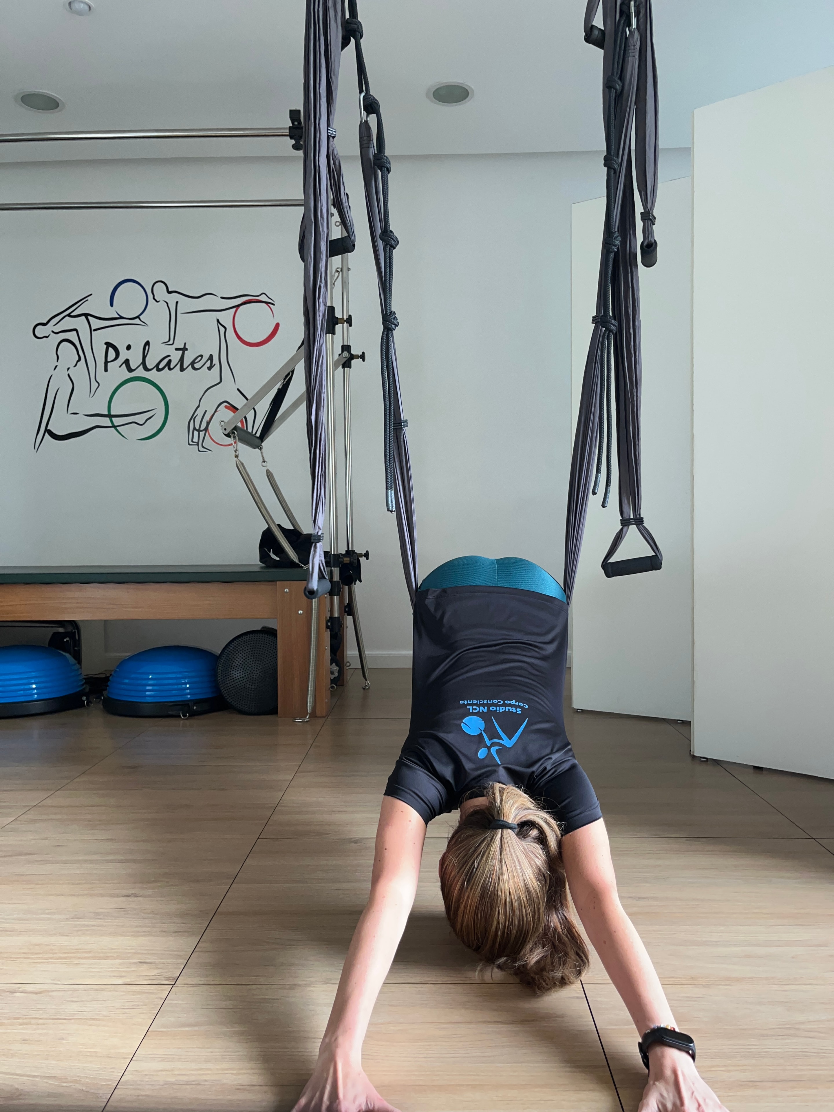 Sessão de Pilates Terapêutico com instrutora